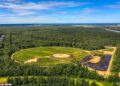 The woman is found dead a week after her funeral in Russia